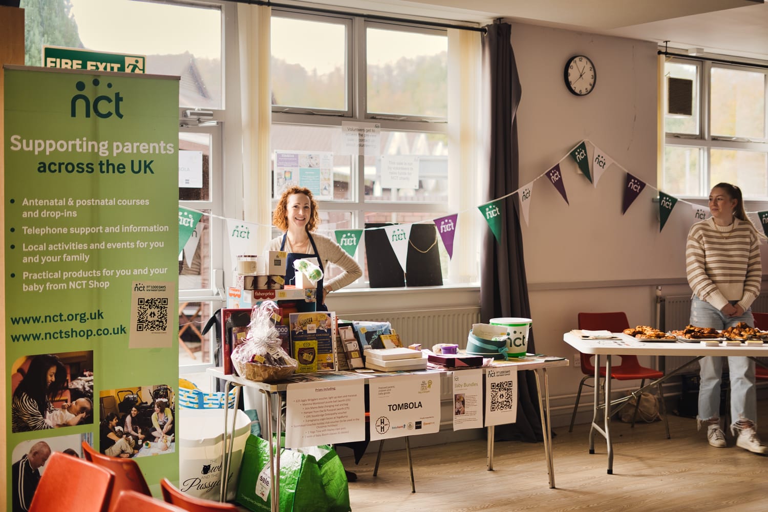 People manning stalls at an NCT Nearly New Sale
