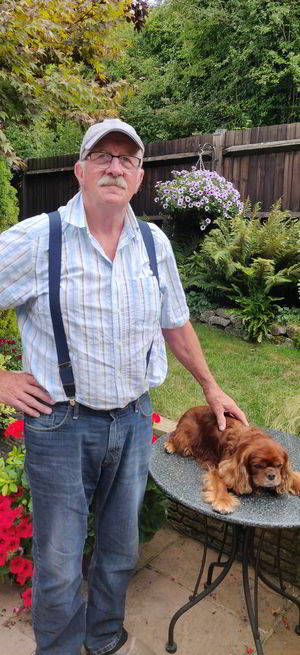Badger Farm Community Centre's Caretaker Merv with his dog Charlie