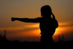 A women practicing self-defence