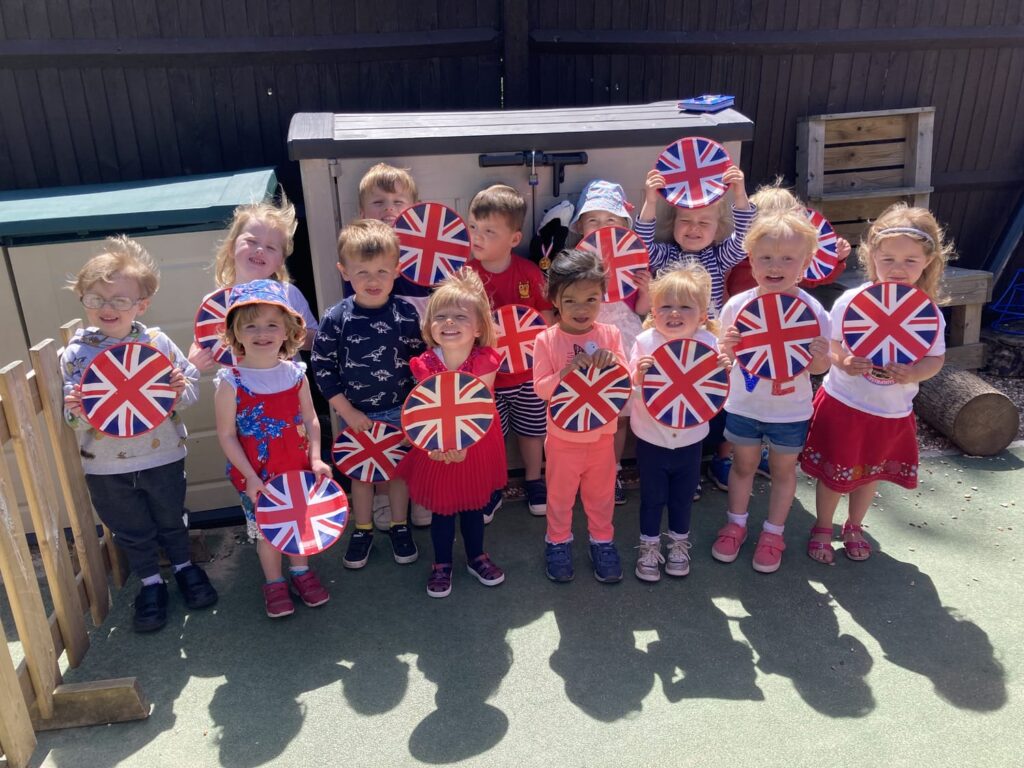 Children at Badger Farm Pre-school dressed up in red, white and blue for the Jubilee celebrations in summer 2022