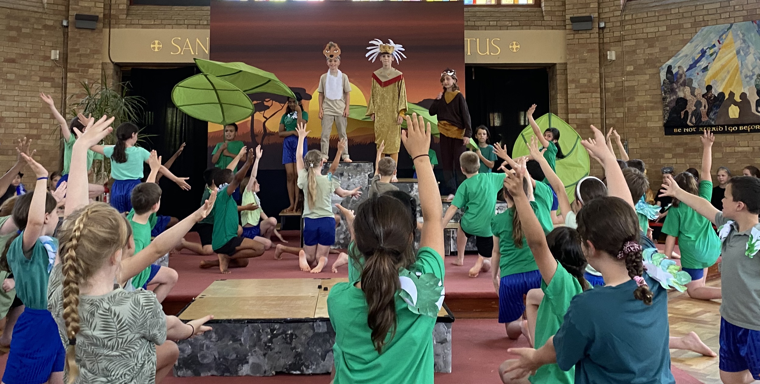 A group of pupils taking part in St Peter's Primary School production of The Lion King