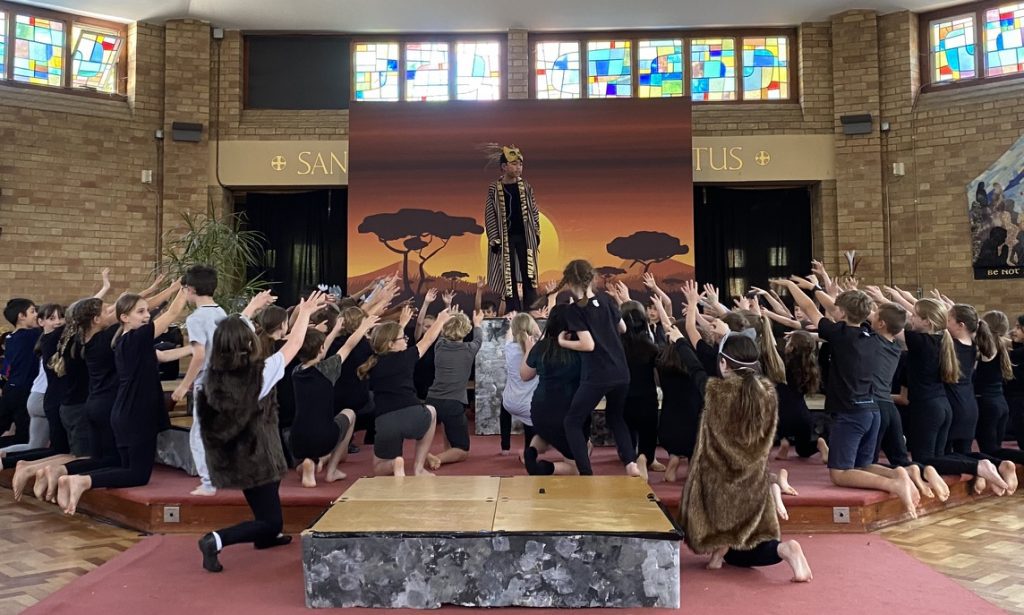A group of pupils taking part in St Peter's Primary School production of The Lion King