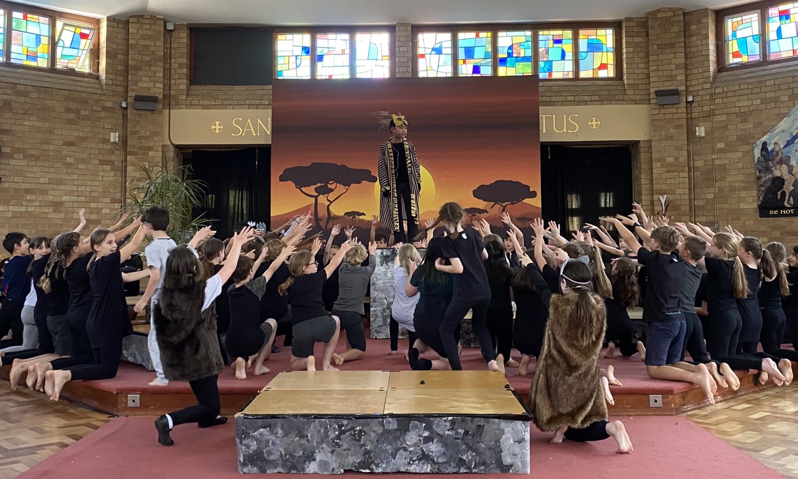 A group of pupils taking part in St Peter's Primary School production of The Lion King