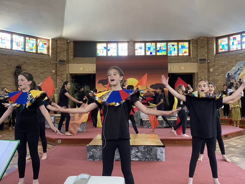 A group of pupils taking part in St Peter's Primary School production of The Lion King