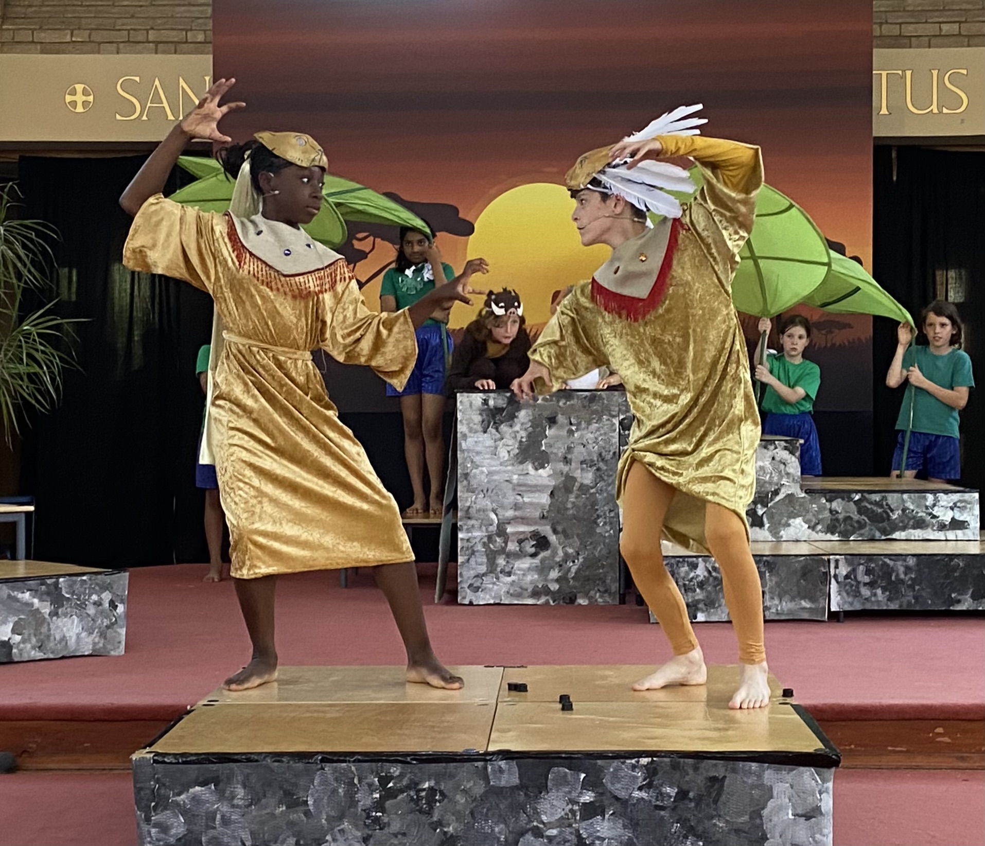 Two pupils taking part in St Peter's Primary School production of The Lion King