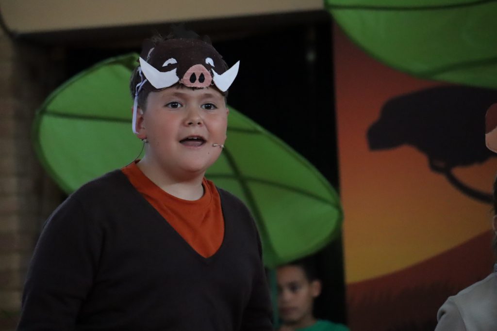 A pupil taking part in St Peter's Primary School production of The Lion King
