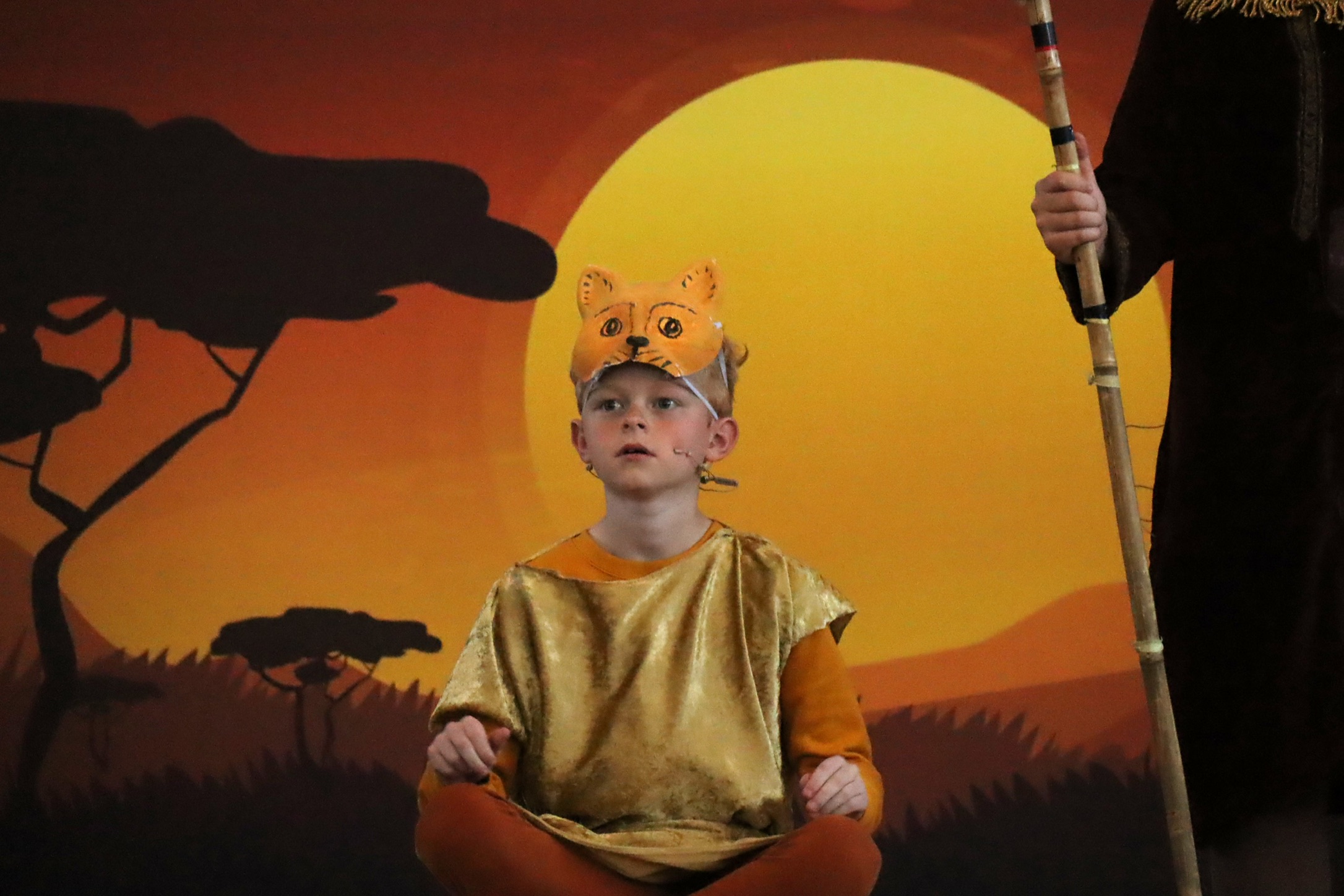 A pupil taking part in St Peter's Primary School production of The Lion King