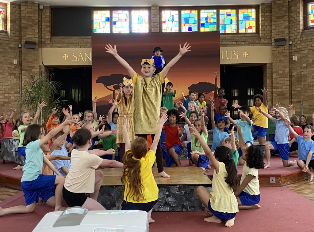 A group of pupils taking part in St Peter's Primary School production of The Lion King