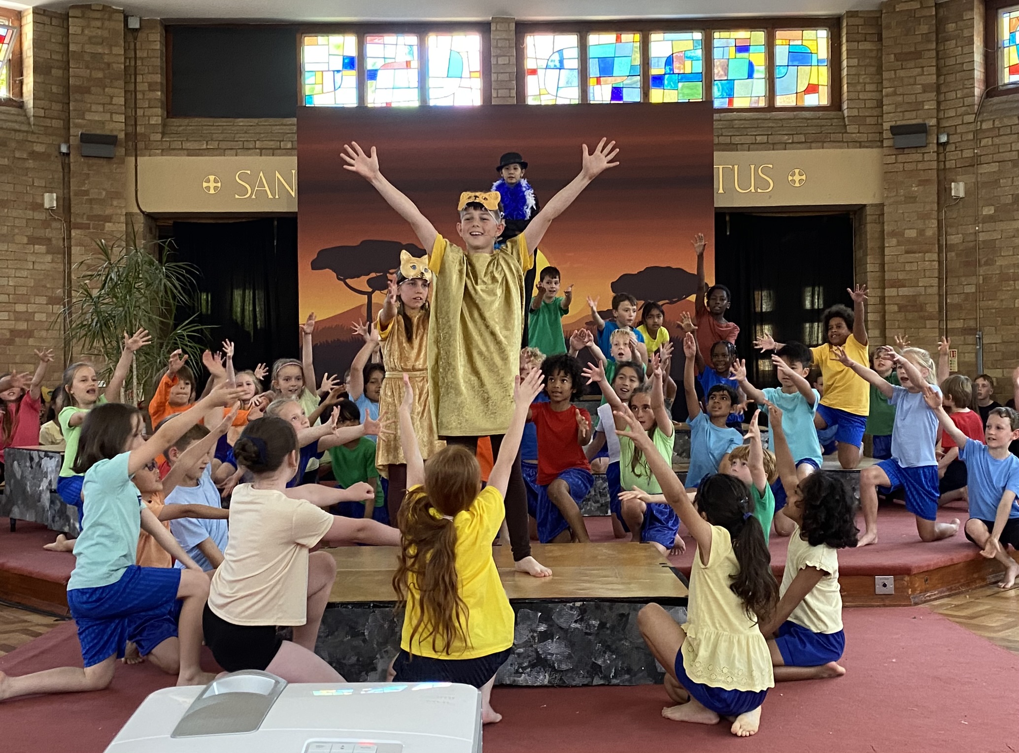 A group of pupils taking part in St Peter's Primary School production of The Lion King